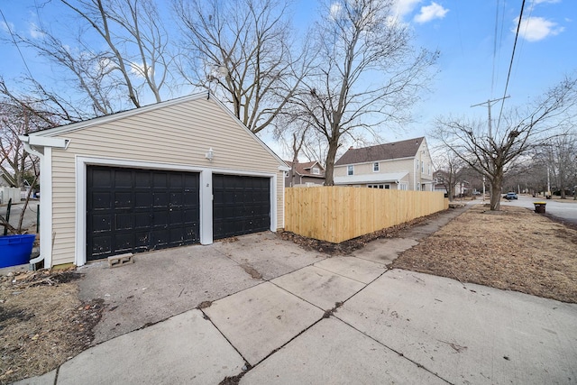 detached garage with fence