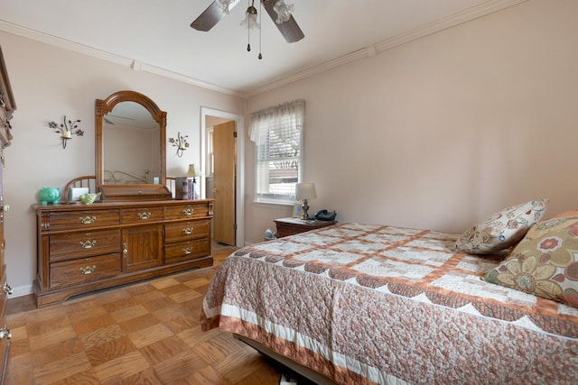 bedroom featuring ornamental molding, baseboards, and a ceiling fan