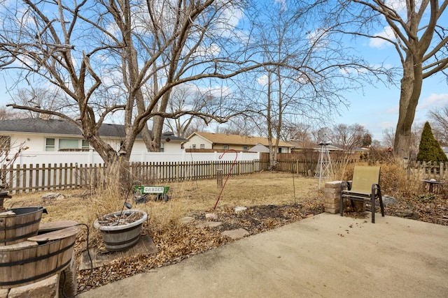 view of yard featuring a patio and fence private yard