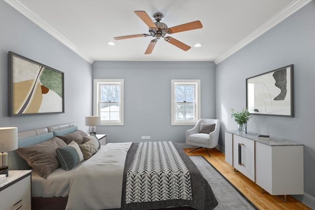 bedroom with light wood finished floors, multiple windows, crown molding, and recessed lighting