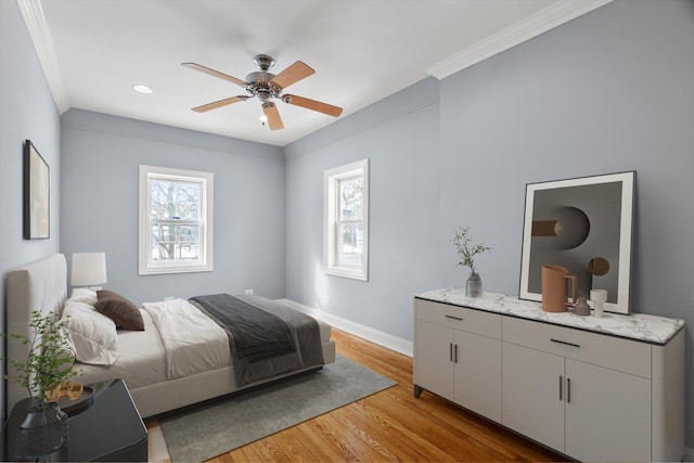 bedroom featuring recessed lighting, a ceiling fan, baseboards, light wood-style floors, and ornamental molding