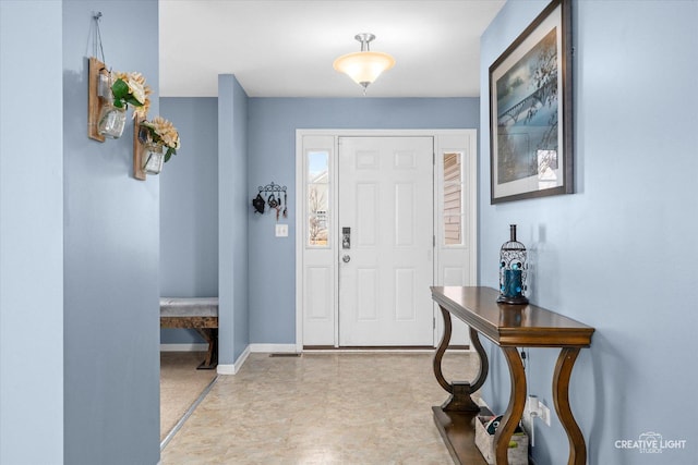 foyer with baseboards