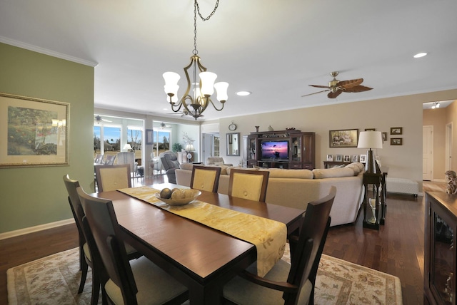 dining area with dark wood-style floors, baseboards, and ornamental molding