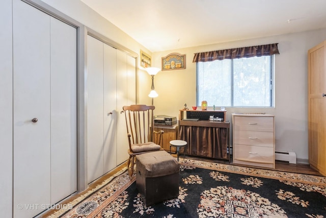 sitting room with a baseboard radiator