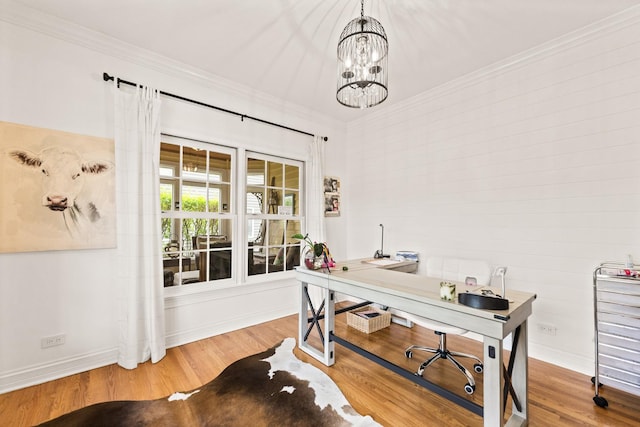 home office with an inviting chandelier, baseboards, crown molding, and wood finished floors