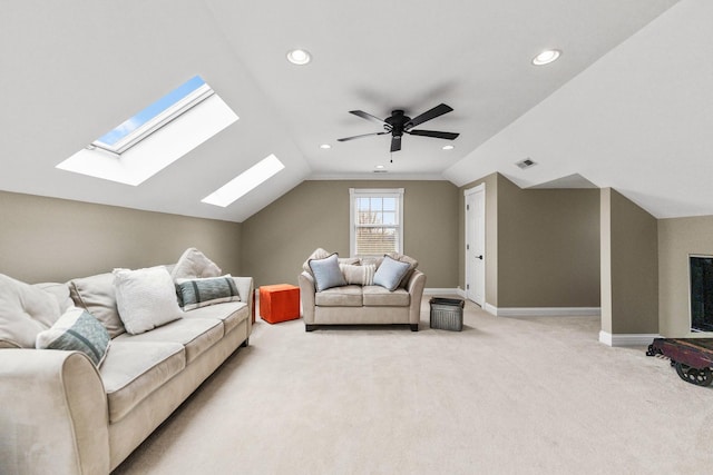 living room with recessed lighting, baseboards, lofted ceiling with skylight, and light carpet