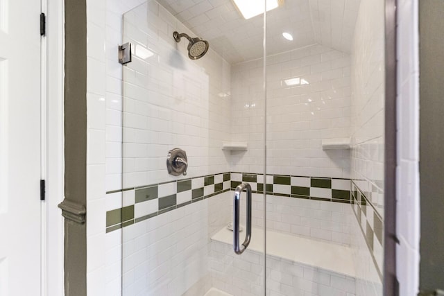 full bath with a shower stall