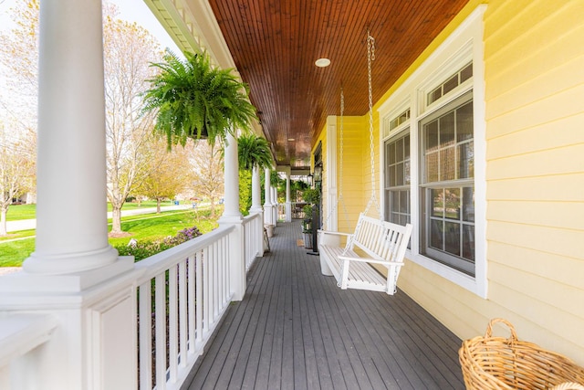 wooden terrace featuring a porch