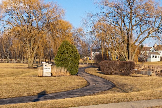 surrounding community with a yard