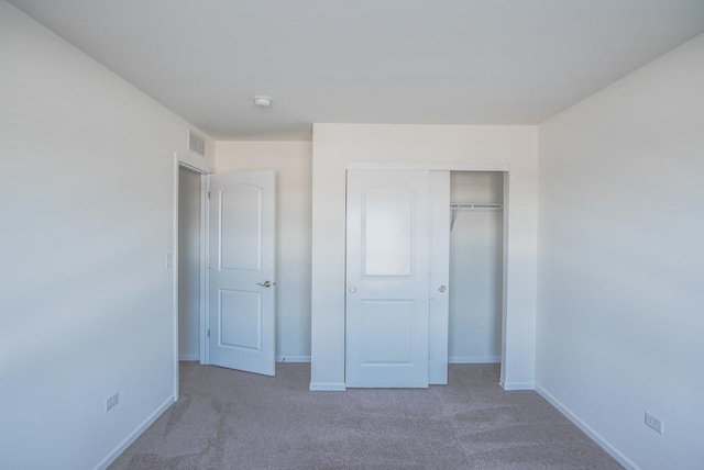 3718 Tramore Ct, Naperville, IL 60564 - unfurnished bedroom featuring carpet, a closet, visible vents, and baseboards