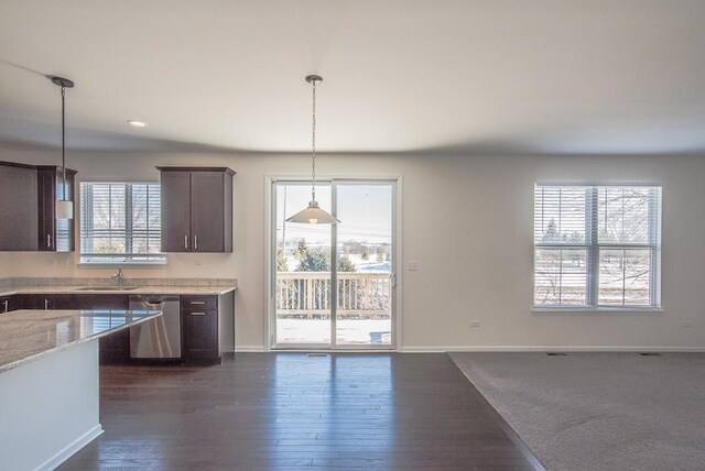 3718 Tramore Ct, Naperville, IL 60564 - kitchen featuring dark brown cabinetry, dark wood-style flooring, a sink, hanging light fixtures, and stainless steel dishwasher