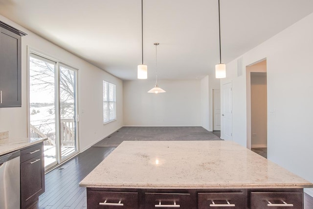 3718 Tramore Ct, Naperville, IL 60564 - kitchen with light stone counters, a center island, dishwasher, and dark brown cabinets