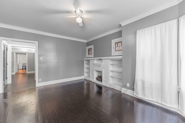 living area featuring crown molding, a fireplace, a ceiling fan, wood finished floors, and baseboards