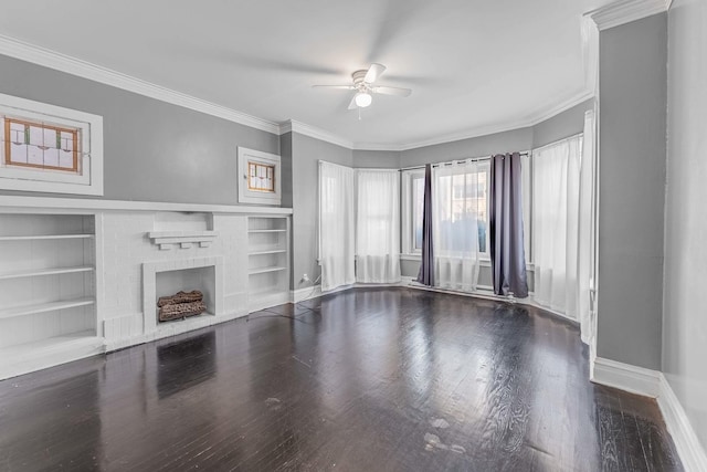 unfurnished living room featuring ornamental molding, a fireplace, built in features, and wood finished floors