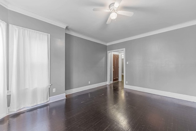 unfurnished room featuring ornamental molding, ceiling fan, baseboards, and wood finished floors