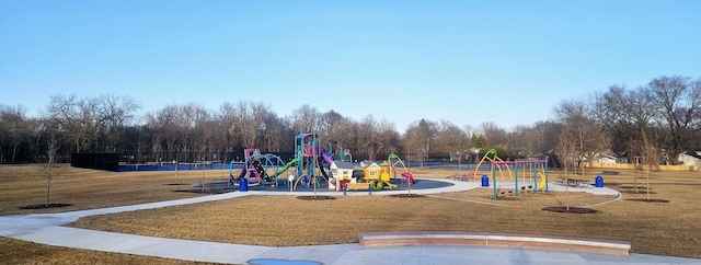 community playground featuring a lawn