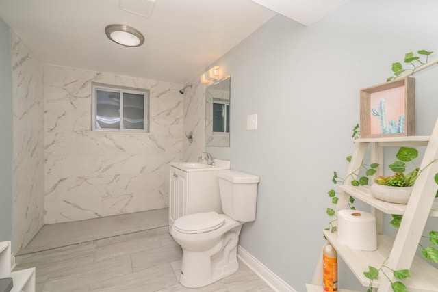 full bath featuring marble finish floor, visible vents, toilet, baseboards, and walk in shower