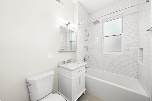 full bathroom featuring visible vents, toilet, tile patterned flooring, bathing tub / shower combination, and vanity