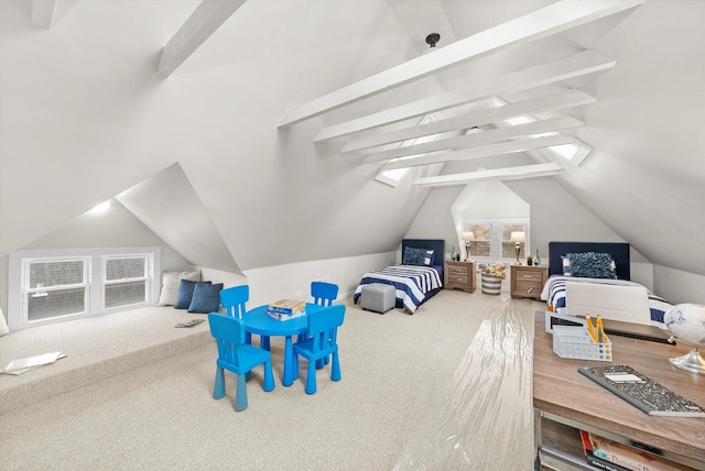 carpeted bedroom with lofted ceiling with skylight