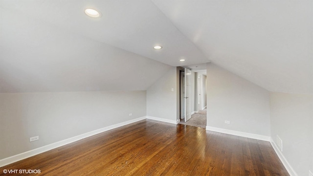 bonus room with visible vents, lofted ceiling, wood finished floors, recessed lighting, and baseboards