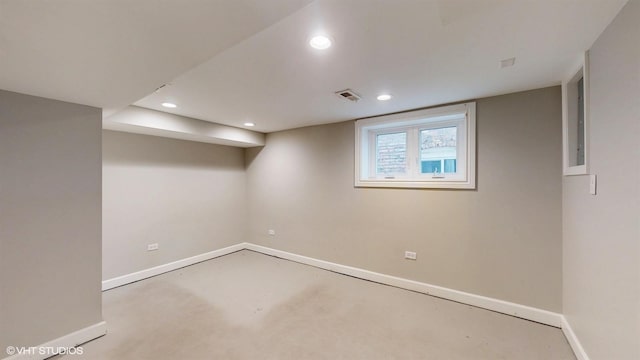 below grade area featuring visible vents, recessed lighting, and baseboards