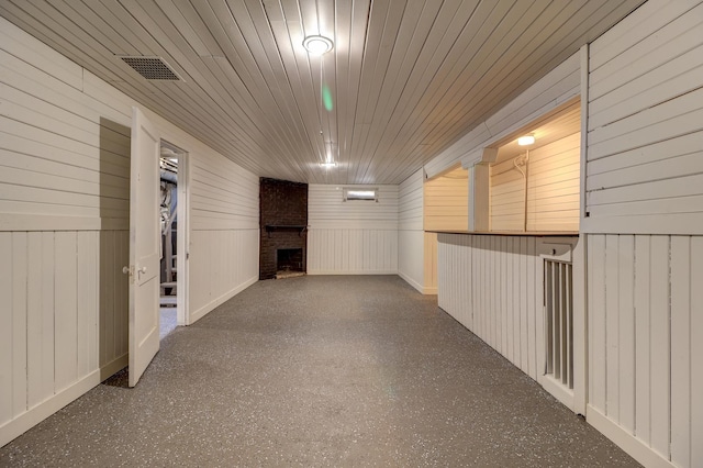 interior space featuring a fireplace and visible vents