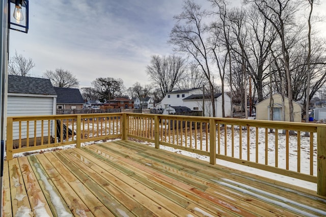 deck featuring a residential view and fence