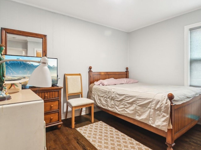 bedroom featuring wood finished floors