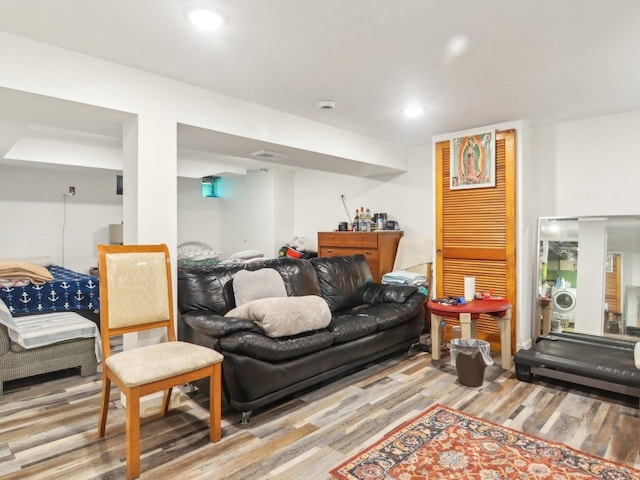 living room featuring recessed lighting and wood finished floors