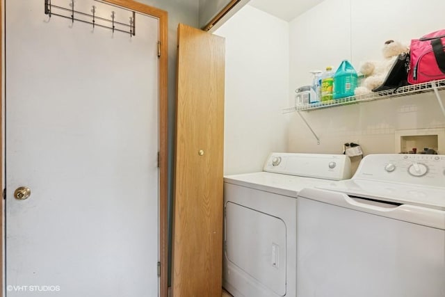 laundry room featuring laundry area and washer and clothes dryer