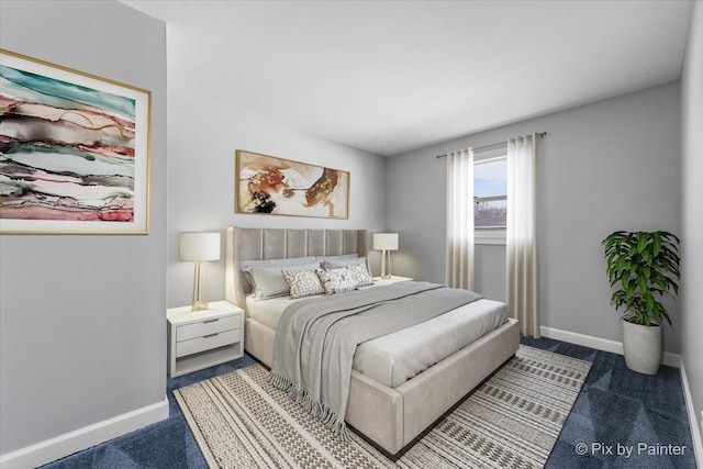 carpeted bedroom featuring baseboards