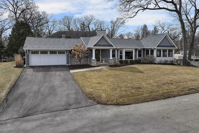 exterior space with a shingled roof, a residential view, and fence