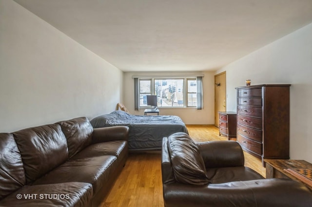 bedroom featuring light wood-style flooring