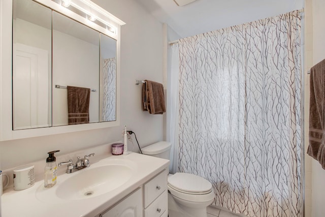 bathroom featuring tile patterned floors, vanity, toilet, and a shower with curtain