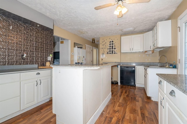 kitchen with dark wood-type flooring, white cabinets, a sink, white fridge with ice dispenser, and dishwasher