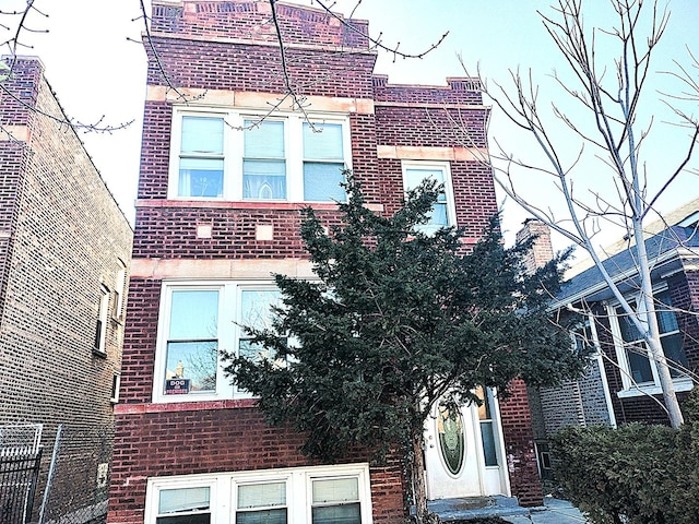 view of front of property with brick siding