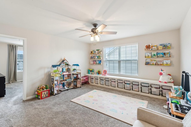 game room featuring a ceiling fan, carpet flooring, and baseboards