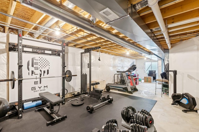 exercise room featuring visible vents