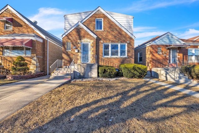 view of front of house with brick siding