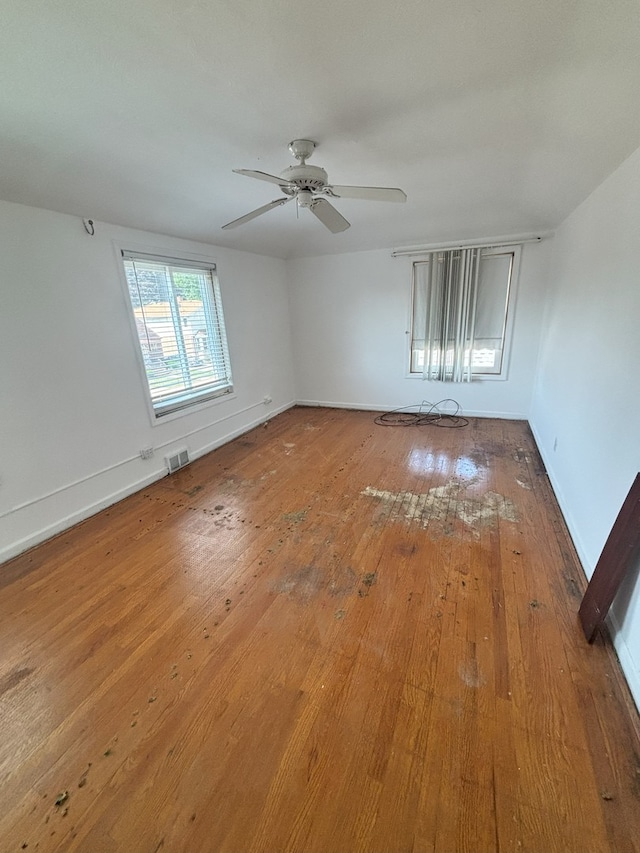2820 W 84th St, Chicago, IL 60652 - unfurnished room featuring hardwood / wood-style floors and ceiling fan