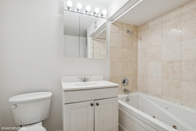 bathroom featuring toilet, bathing tub / shower combination, and vanity