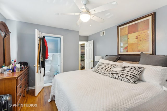 7311 N Ashland Blvd Unit 2A, Chicago, IL 60626 - bedroom with wood finished floors and ceiling fan