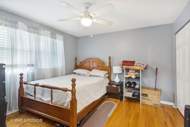 7311 N Ashland Blvd Unit 2A, Chicago, IL 60626 - bedroom featuring a closet, wood finished floors, and a ceiling fan