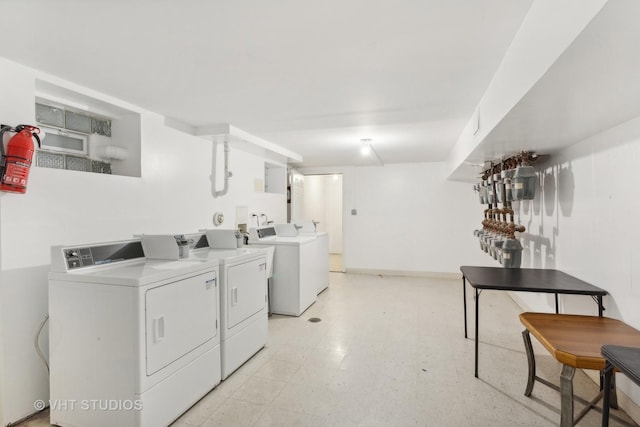7311 N Ashland Blvd Unit 2A, Chicago, IL 60626 - shared laundry room with washing machine and clothes dryer and light flooring