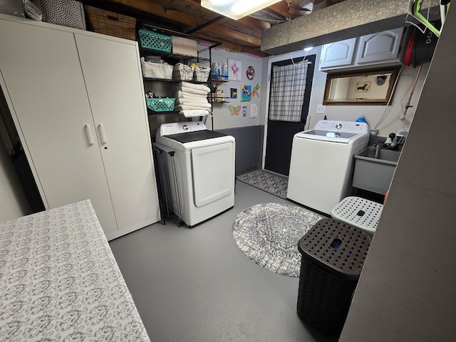 laundry area featuring laundry area and washing machine and dryer