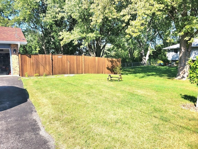 view of yard with fence