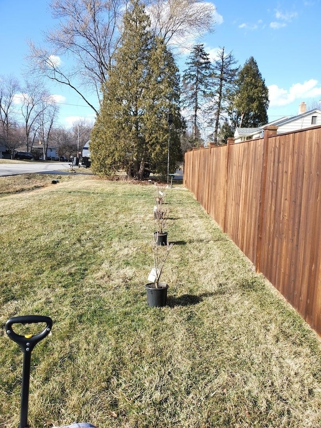 view of yard with fence