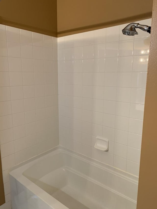 full bathroom with tub / shower combination