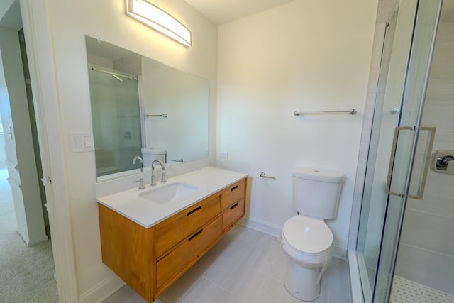 full bath featuring toilet, a shower stall, baseboards, and vanity