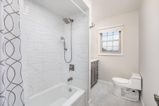 bathroom with baseboards, toilet, marble finish floor, shower / bath combination with curtain, and vanity